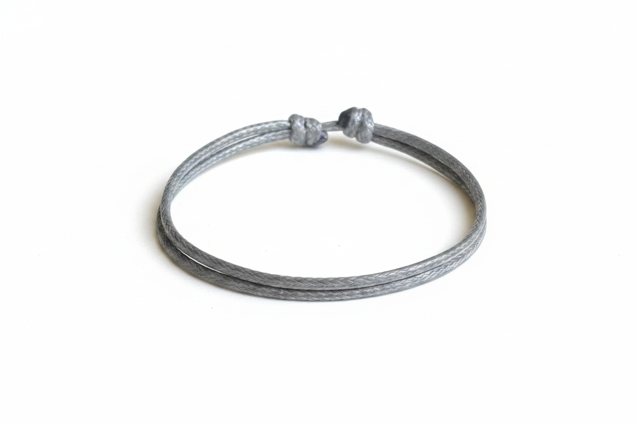 Handmade Grey Waxed Cord Bracelet on White Background