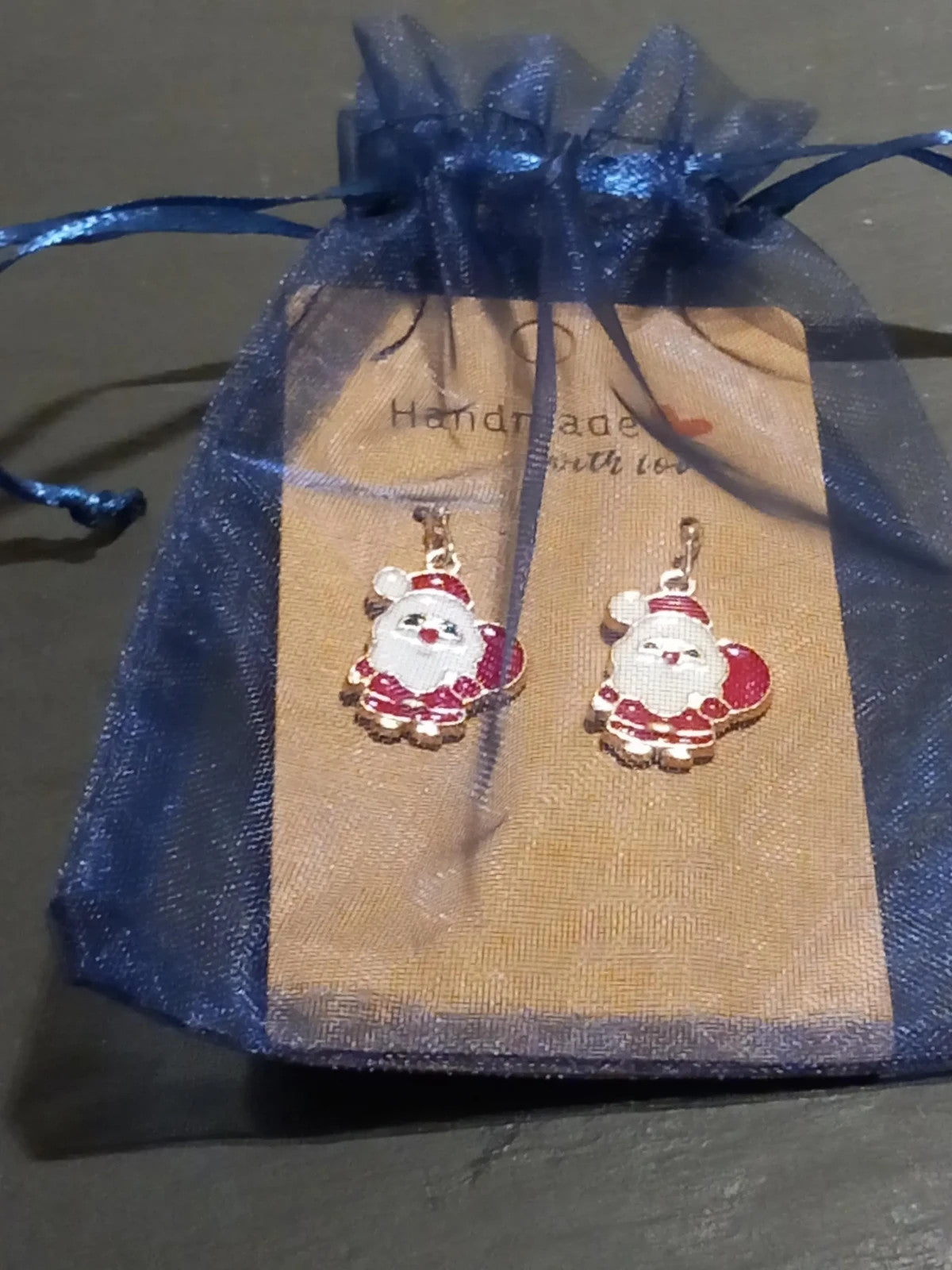 Santa Claus earrings in free gift bag.
